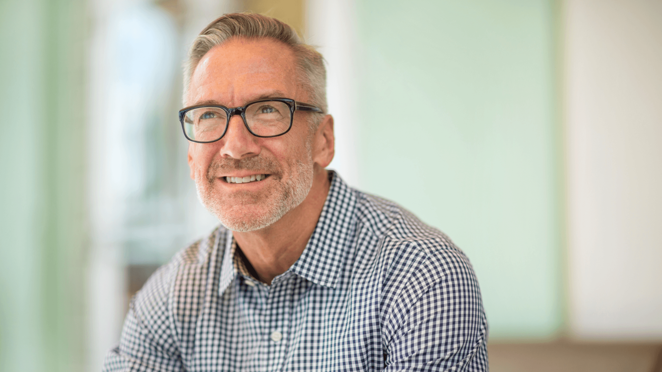 A decision scale balancing a "Sell Now" sign and a "Wait and Build Value" sign with a 2026 calendar in the background.