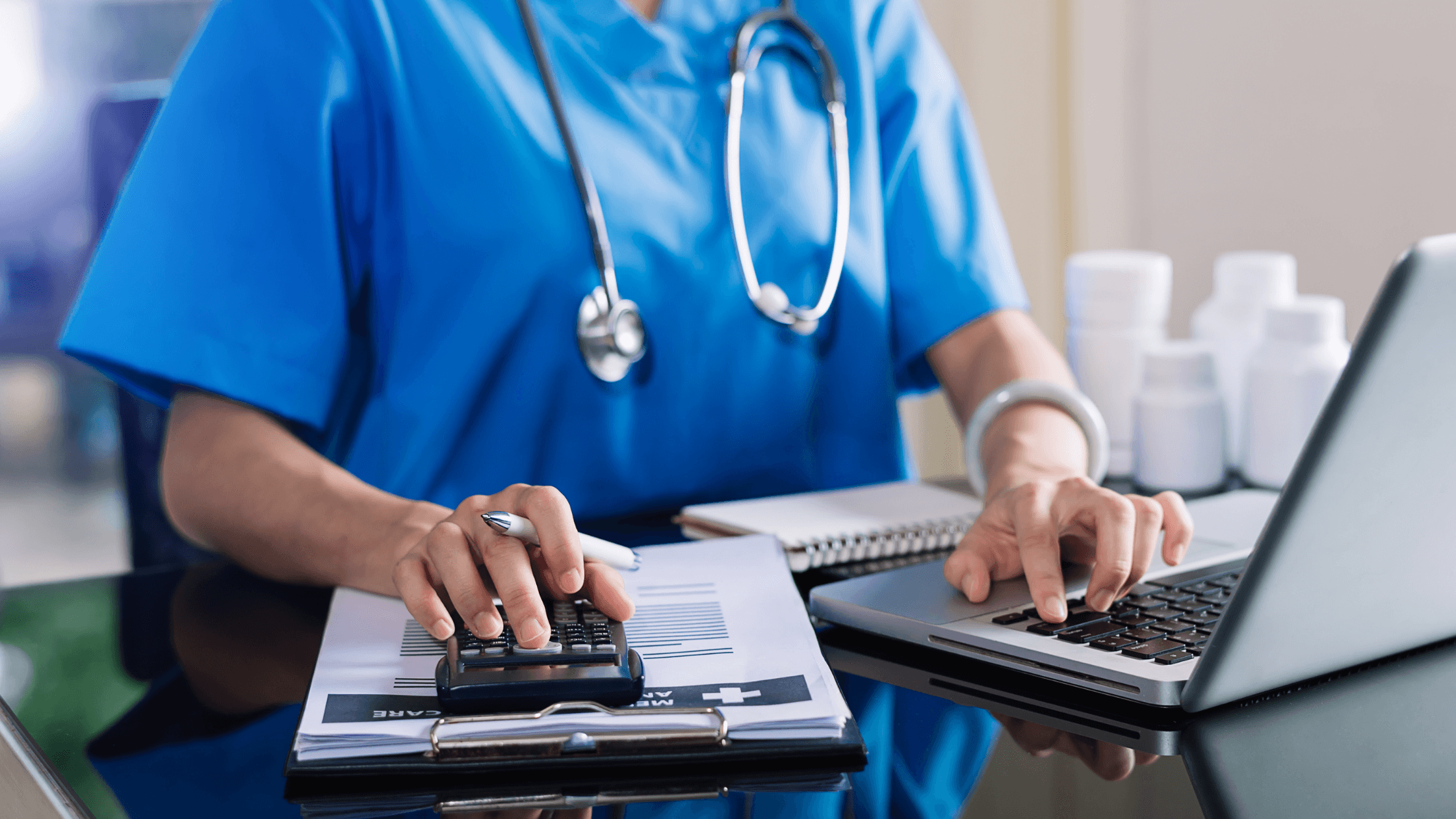 Healthcare business owner calculating valuation multiples to prepare for selling a home health or medical services company